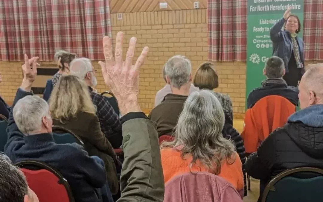 Image of Ellie Chowns and audience at an open meeting in Fownhope