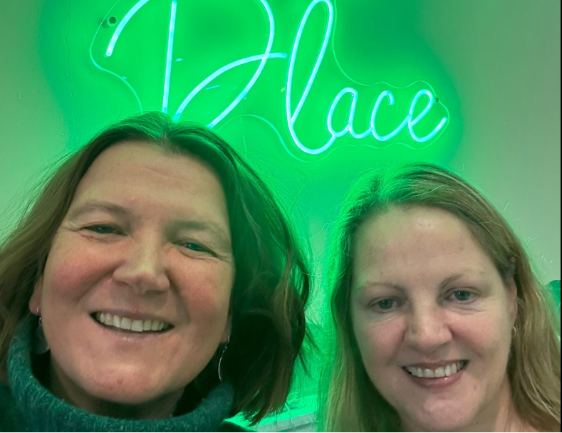 On the photo MP Ellie Chowns with Lee (owner of the place). Behind them is neon-lightning decoration, which is saying Place