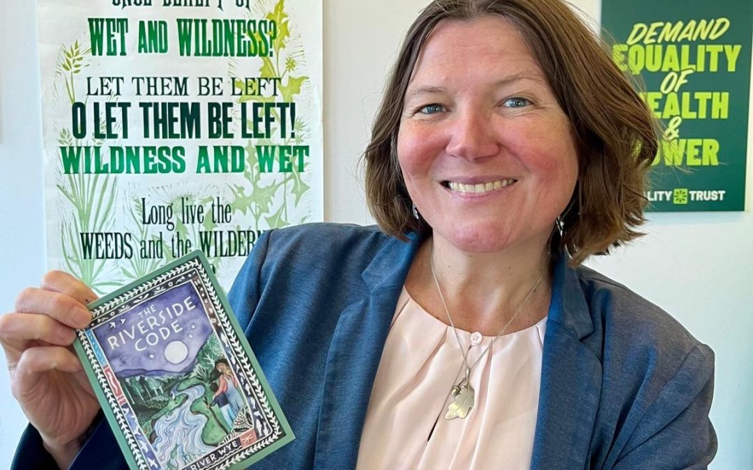 Ellie Chowns is holding Riverside booklet.